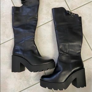 Black leather platform boots